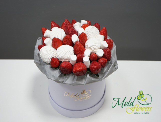 Box with strawberries and marshmallows photo